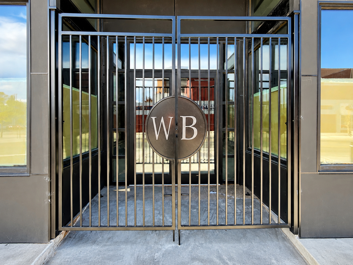 WB gate medallion detail at The Whitney Block entrance